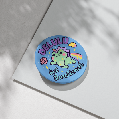 “Delulu But Functional” – Pin Badge, Magnet or Sticker for Neurospicy Weirdos