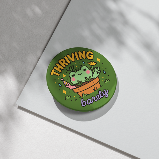 “Thriving Barely” – Pin Badge, Magnet or Sticker for Neurospicy Weirdos